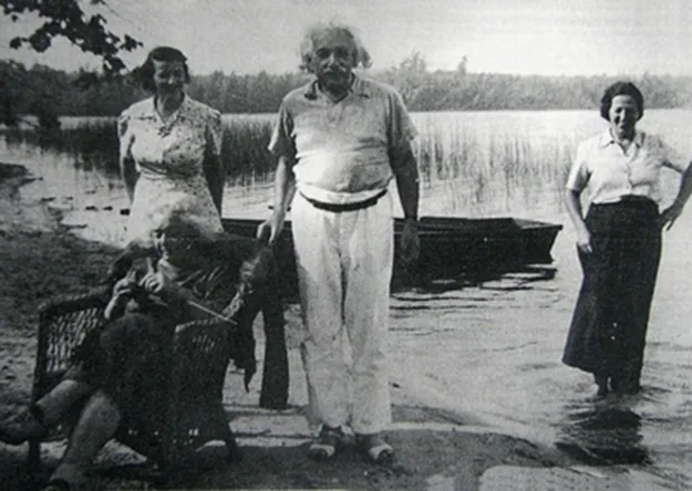 Albert Einstein with his wife (seated) vacationing at Lake Clear. Adirondack Daily Enterprise, August 19, 1989